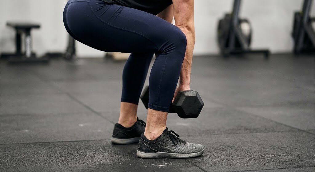 A close-up of a person’s feet and lower legs 